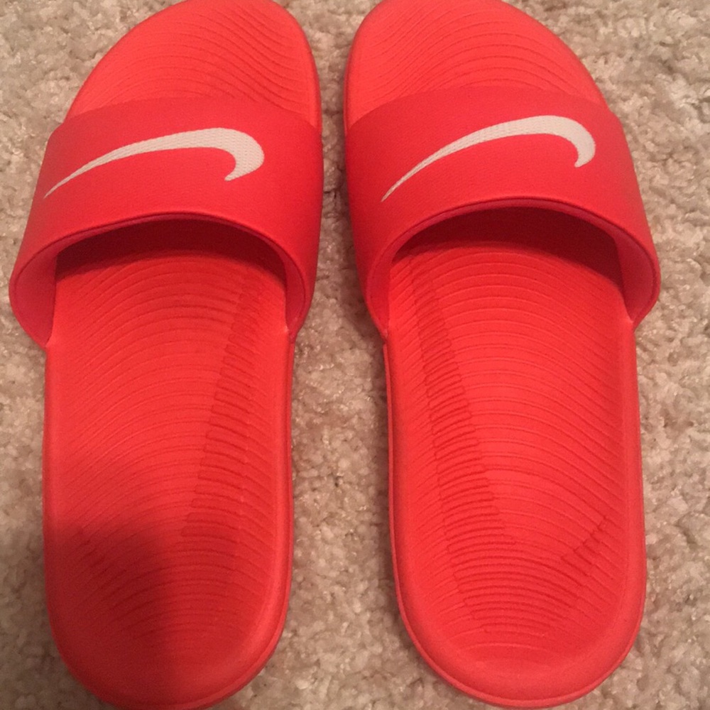 Coral Nike Slides
